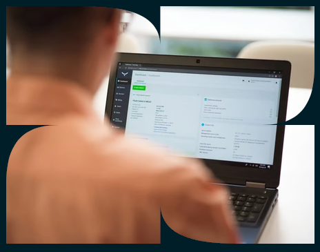 A partner reviewing a management dashboard on a laptop